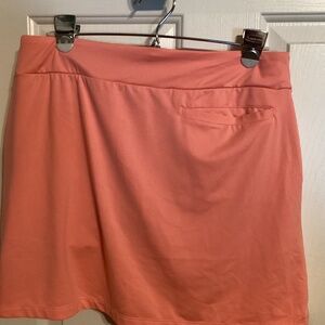 Nike golf skort medium melon pinkish color